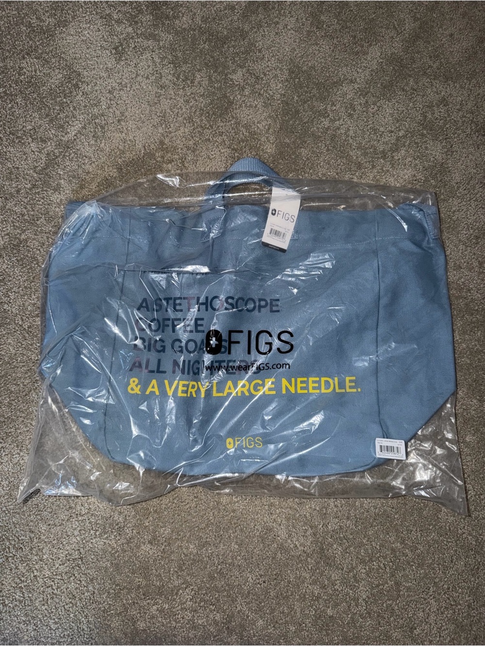 Figs Light Blue Duffel Bag with Yellow Logo Text